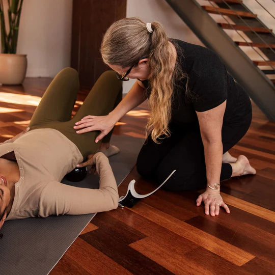 Christine showing muscle tension model